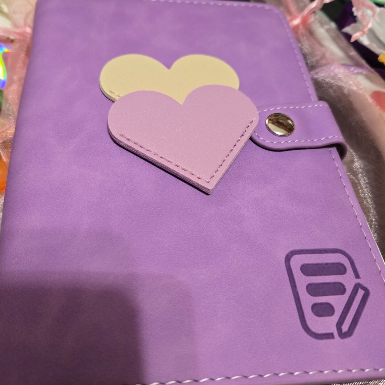 Purple $aving Grace binder with a heart clasp and accessories